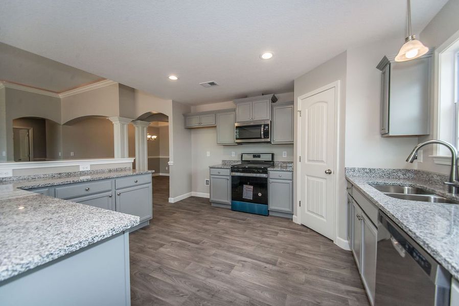 Representative furnished interior of a home built from the Beaumont by Enchanted Homes in Guadalupe Heights, Seguin (Image 13).