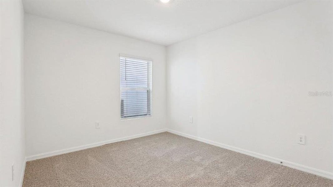 Spacious, unfurnished interior of a new home in Villamar, Winter Haven (Image 20).