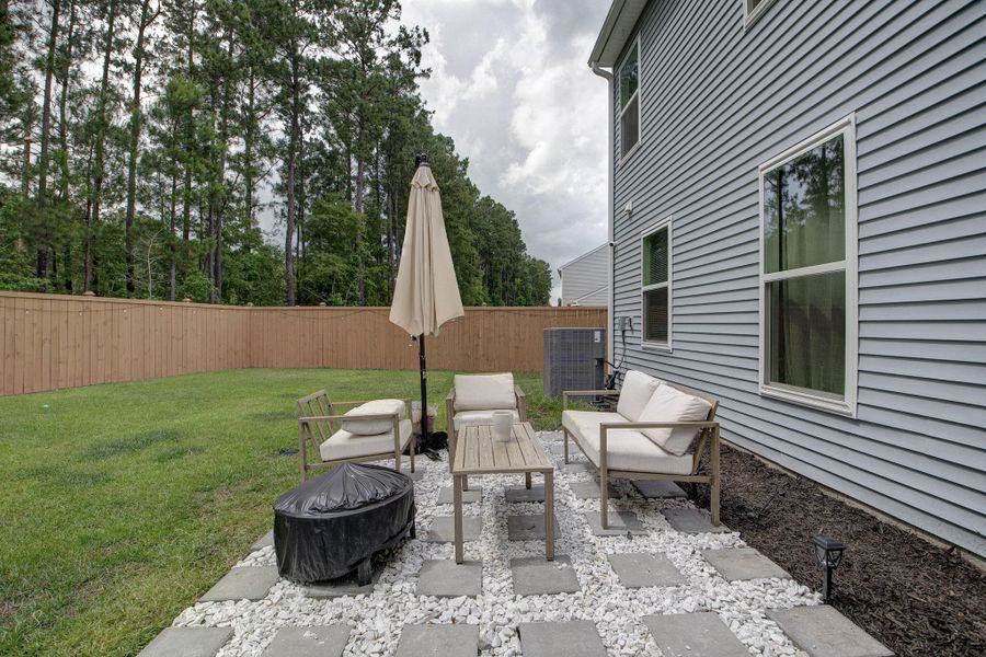 Exterior details and patio area of a home in Oakley Pointe, Moncks Corner (Image 32). Exterior details and patio area of a home in Oakley Pointe, Moncks Corner (Image 32).