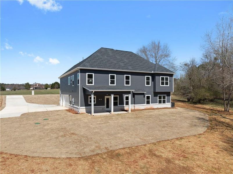 Front exterior of a new home in , Social Circle, GA, highlighting curb appeal (Image 24).