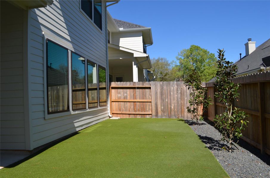 Exterior details and patio area of a home in Summer Place 35', Montgomery (Image 24). Exterior details and patio area of a home in Summer Place 35', Montgomery (Image 24).