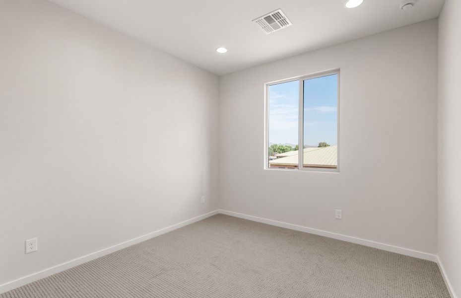 Spacious, unfurnished interior of a new home in Legado West, Queen Creek (Image 27).