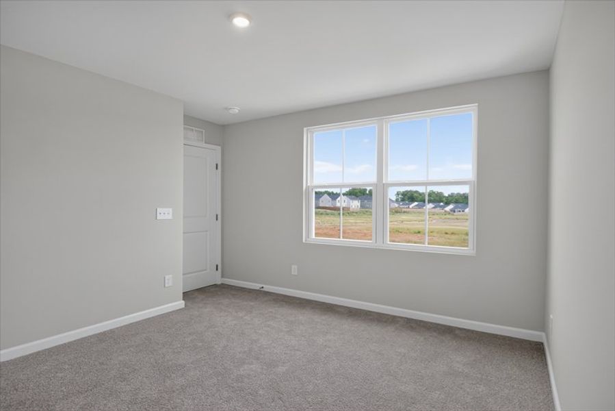 Spacious, unfurnished interior of a new home in Wren Woods 2-Story, Gray Court (Image 28).