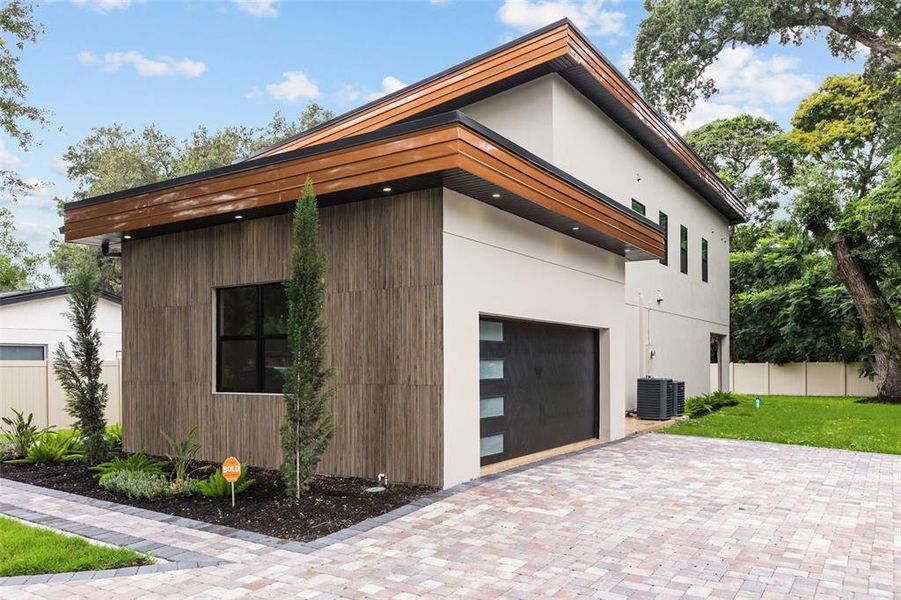 Front exterior of a new home in , Orlando, FL, highlighting curb appeal (Image 29).