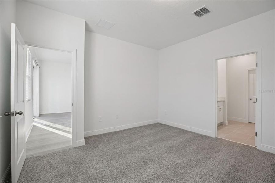 Spacious, unfurnished interior of a new home in Cyrene at Minneola - Villas, Minneola (Image 39).