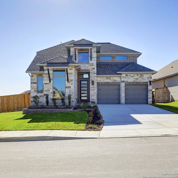 Front exterior of a new home in Arcadia Ridge 50', San Antonio, TX, highlighting curb appeal (Image 21).
