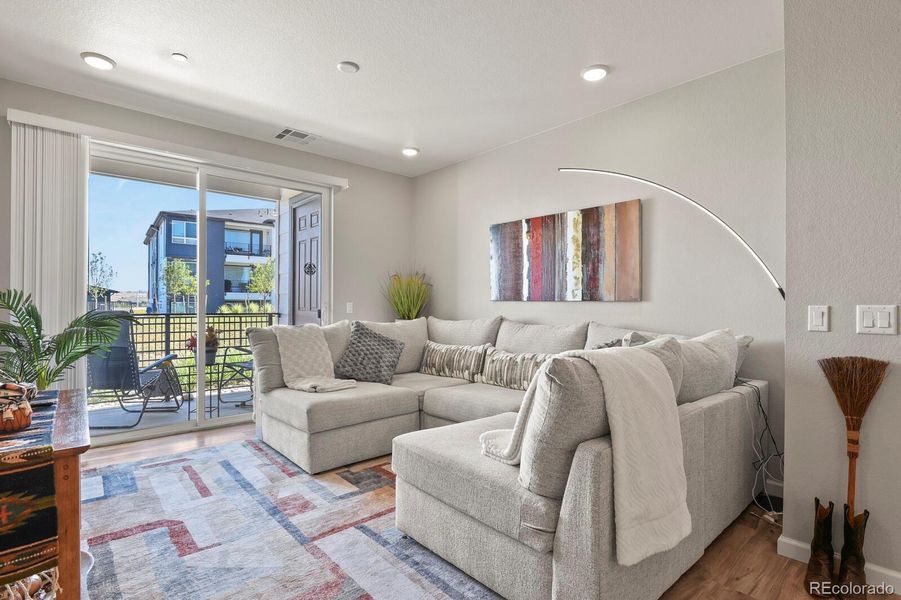 Furnished interior view inside a new home in Stonegate Condos, Parker (Image 7).