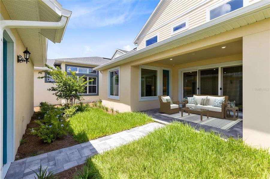 Front exterior of a new home in , Orlando, FL, highlighting curb appeal (Image 28).
