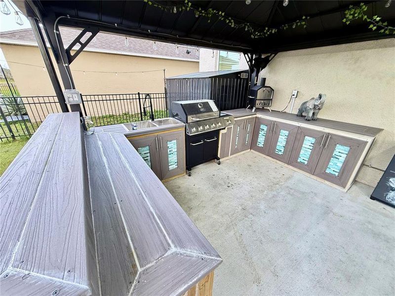 Exterior details and patio area of a home in Harmony West, St. Cloud (Image 32).