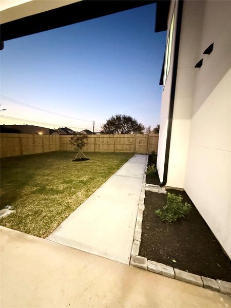 Exterior details and patio area of a home in , Pearland (Image 21).
