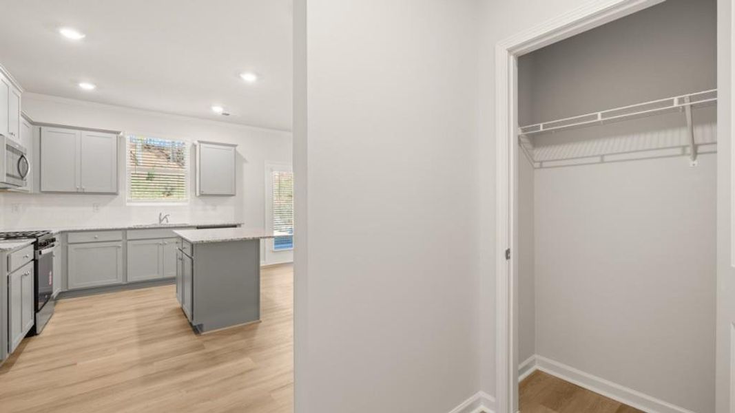 Furnished interior view inside a new home in Northwoods at Mirror Lake, Villa Rica (Image 6).