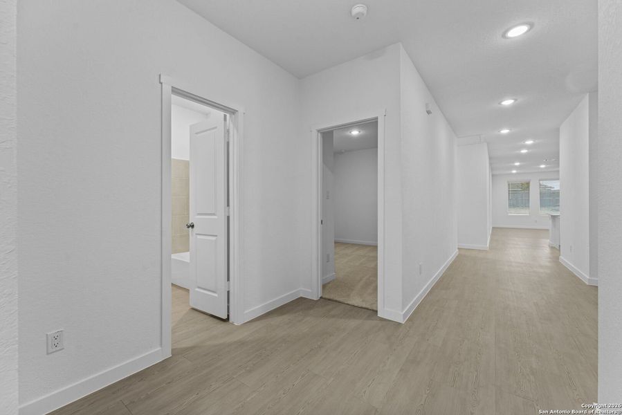 Spacious, unfurnished interior of a new home in Parkside: Coastline Collection, New Braunfels (Image 22).
