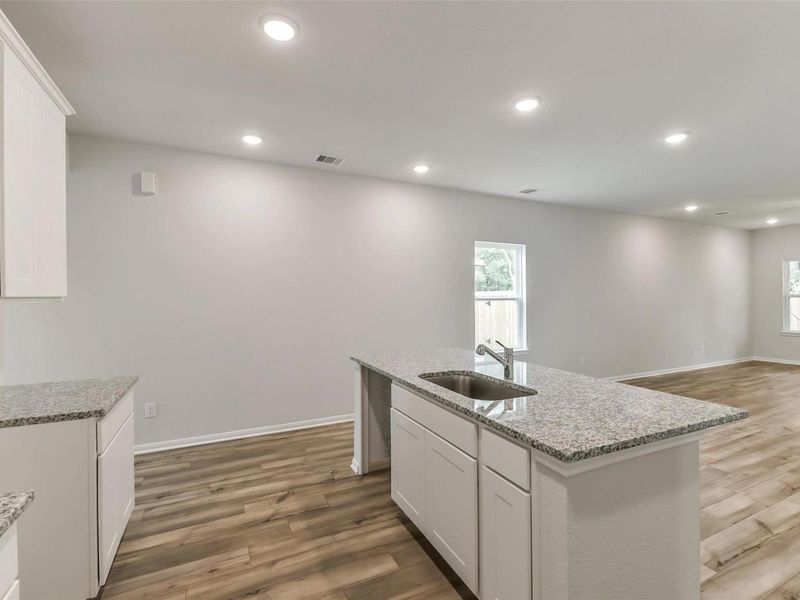 Furnished interior view inside a new home in Caney Creek Place, Conroe (Image 8).