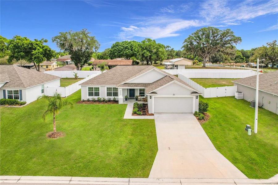 Front exterior of a new home in , Bartow, FL, highlighting curb appeal (Image 24).