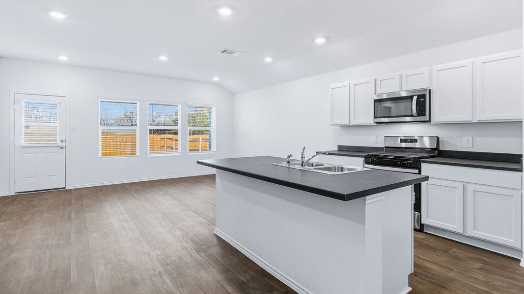 Representative furnished interior of a home built from the The Easton by D.R. Horton in Wayside, Uhland (Image 5).