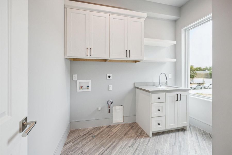 Utility room included on the second floor with plenty of built-in storage, along with Kohler Park Falls enameled cast iron undermount utility sink and Kohler Simplice faucet. Utility room included on the second floor with plenty of built-in storage, along with Kohler Park Falls enameled cast iron undermount utility sink and Kohler Simplice faucet.