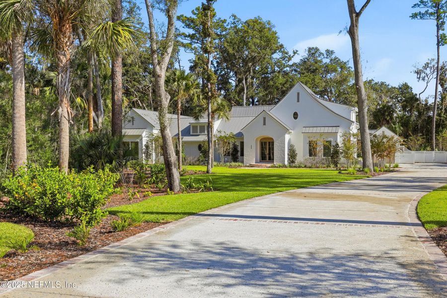 Front exterior of a new home in , Ponte Vedra, FL, highlighting curb appeal (Image 29).