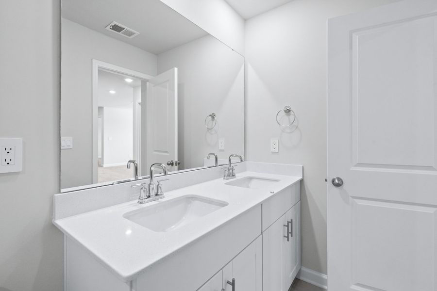 Furnished interior view inside a new home in Waterside - Coastline Series, Longs (Image 10).