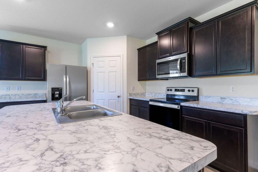 Furnished interior view inside a new home in , Port St. Lucie (Image 3).