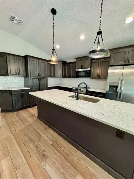 Furnished interior view inside a new home in , Dunnellon (Image 7).
