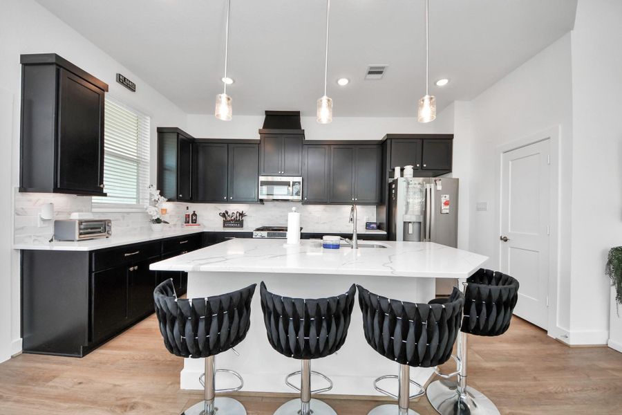 Furnished interior view inside a new home in Meridiana Courtyard Collection, Manvel (Image 34).