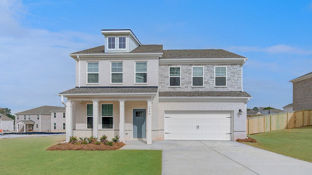 Representative exterior photo of a completed home built from the Ridgewood by DRB Homes in Burchwood, Stockbridge, GA (Image 22). Representative exterior photo of a completed home built from the Ridgewood by DRB Homes in Burchwood, Stockbridge, GA (Image 22).