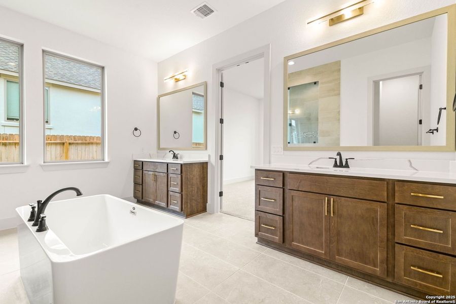 Furnished interior view inside a new home in Ventana - 70', Bulverde (Image 7).