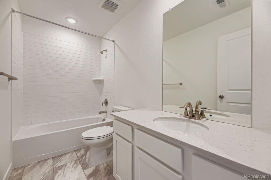 Furnished interior view inside a new home in Ken-Caryl Ranch: The Monarch Collection, Littleton (Image 5).