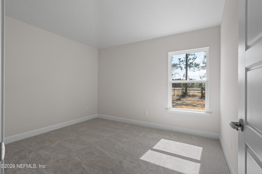 Spacious, unfurnished interior of a new home in Shadow Crest at Rolling Hills, Green Cove Springs (Image 12).