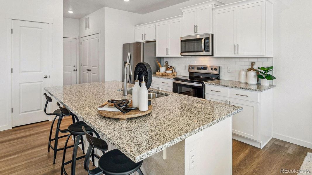 Furnished interior view inside a new home in The Ridge at Lorson Ranch, Colorado Springs (Image 21).