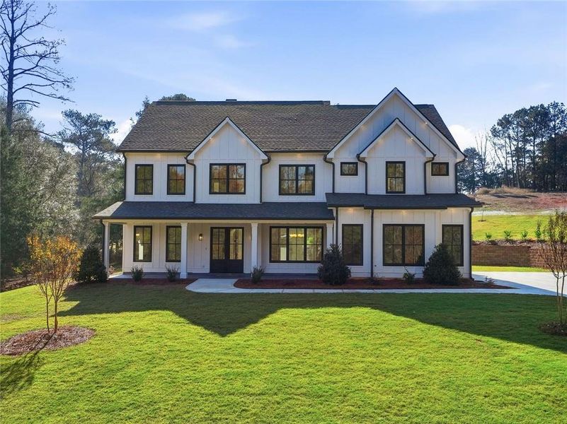 Front exterior of a new home in , Monroe, GA, highlighting curb appeal (Image 24).