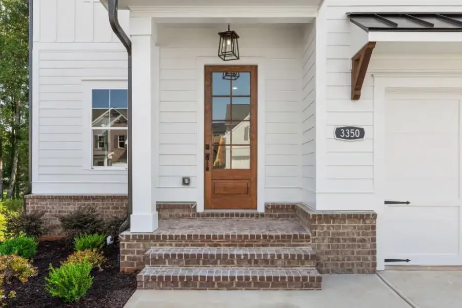 Exterior details and patio area of a home in Hillshire, Cumming (Image 3).