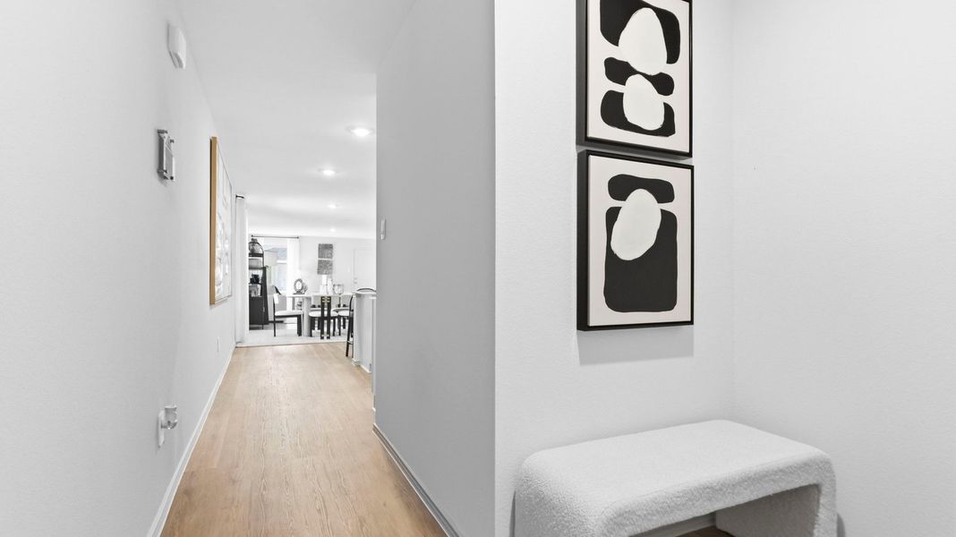 Representative furnished interior of a home built from the Estero by D.R. Horton in Watermark, Alvin (Image 4).