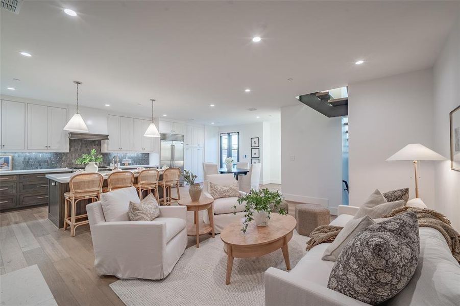 Living room with light wood flooring