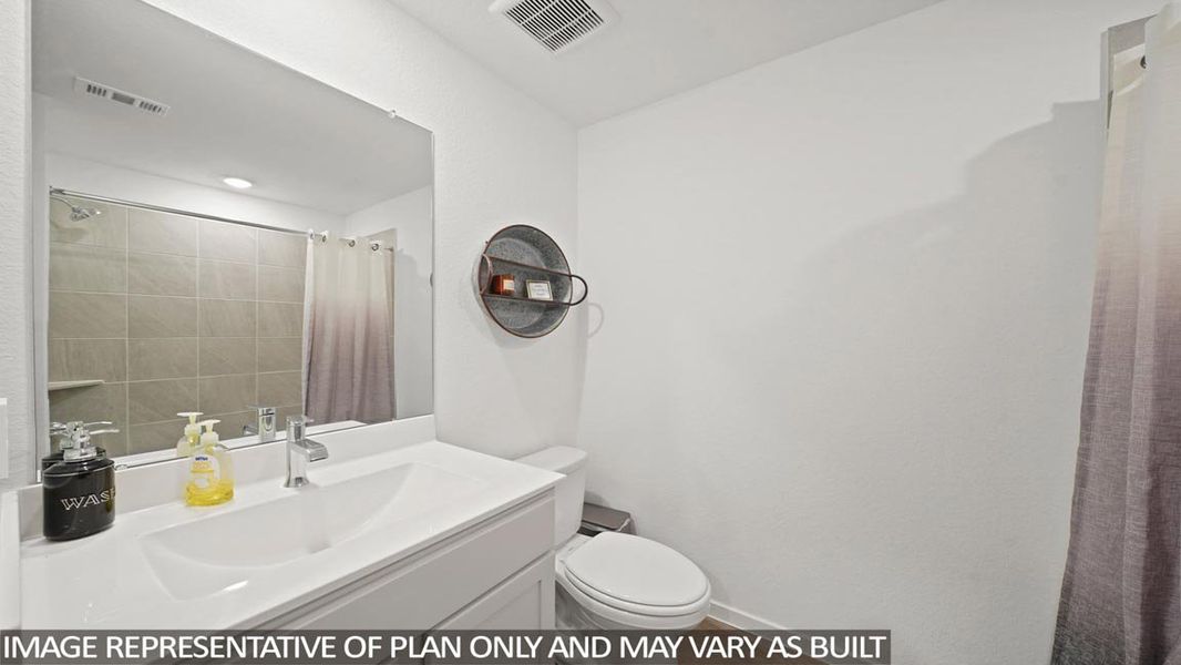 Representative furnished interior of a home built from the Huntsville by D.R. Horton in Granger Pines, Conroe (Image 4).