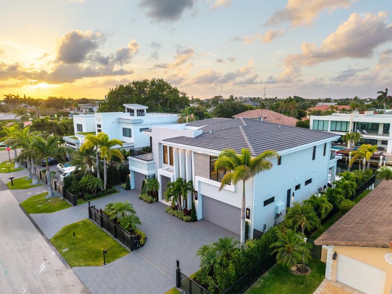 Front exterior of a new home in , Boca Raton, FL, highlighting curb appeal (Image 2). Front exterior of a new home in , Boca Raton, FL, highlighting curb appeal (Image 2).