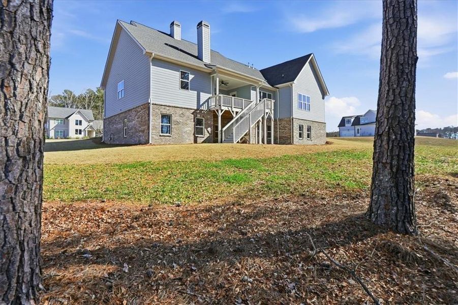 Exterior details and patio area of a home in Old Town Estates, Dacula (Image 36).