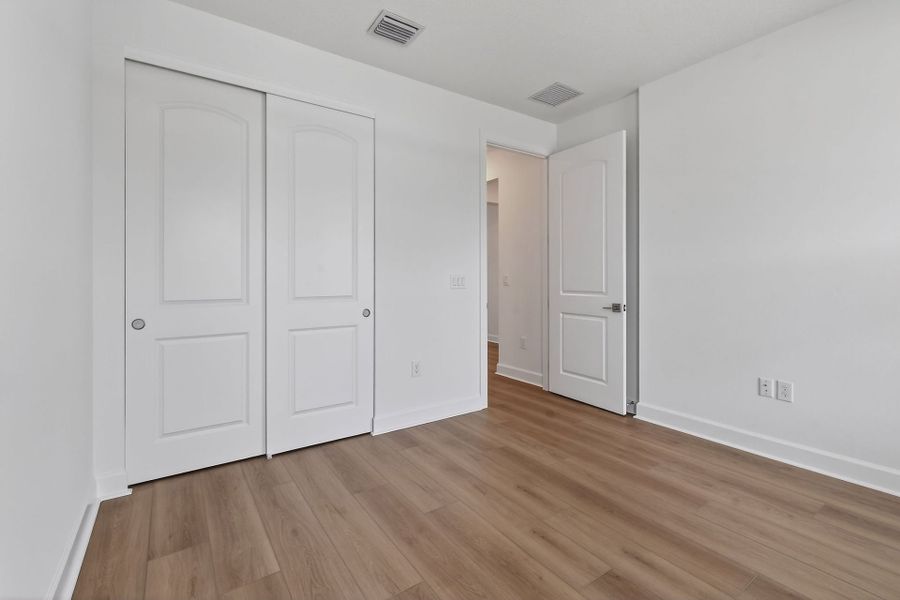 Spacious, unfurnished interior of a new home in Del Webb Tradition, Port St. Lucie (Image 25).