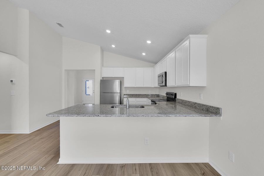 Furnished interior view inside a new home in , Jacksonville (Image 6). Furnished interior view inside a new home in , Jacksonville (Image 6).