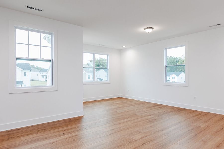 Spacious, unfurnished interior of a new home in High Grove Oaks, Fuquay Varina (Image 12).