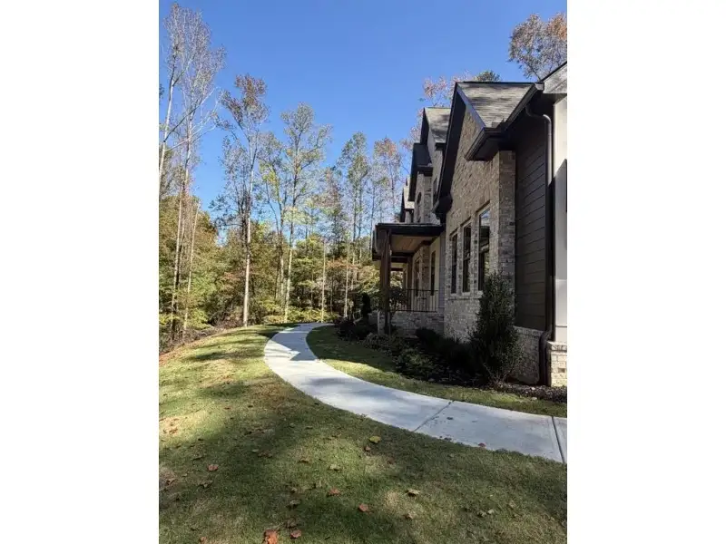 Exterior details and patio area of a home in , Hoschton (Image 26).