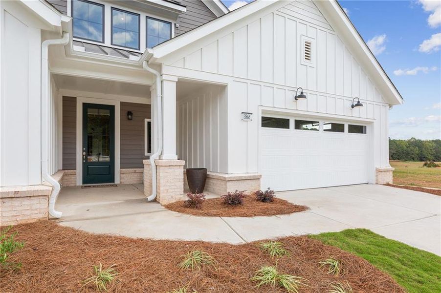 Exterior details and patio area of a home in The Courtyards by The Manor, Alpharetta (Image 4). Exterior details and patio area of a home in The Courtyards by The Manor, Alpharetta (Image 4).