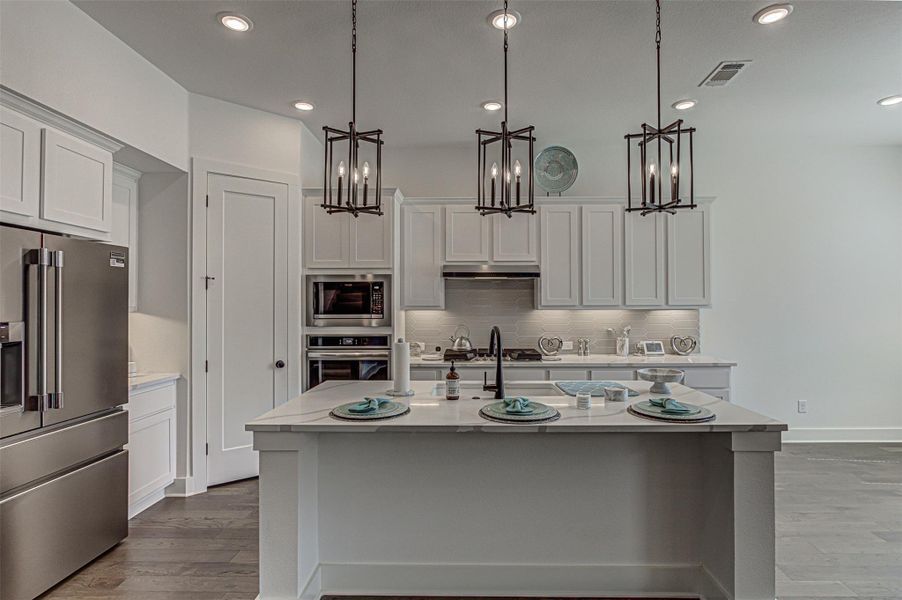 Furnished interior view inside a new home in Flora, Hutto (Image 17).