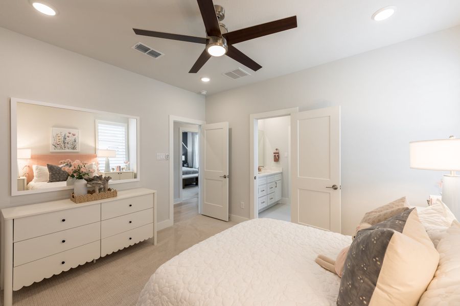 Representative furnished interior of a home built from the Woodbridge by Tri Pointe Homes in Bridgeland, Cypress (Image 45).