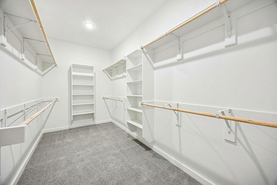 Primary Closet in the Willow home plan by Trophy Signature Homes – REPRESENTATIVE PHOTO Primary Closet in the Willow home plan by Trophy Signature Homes – REPRESENTATIVE PHOTO
