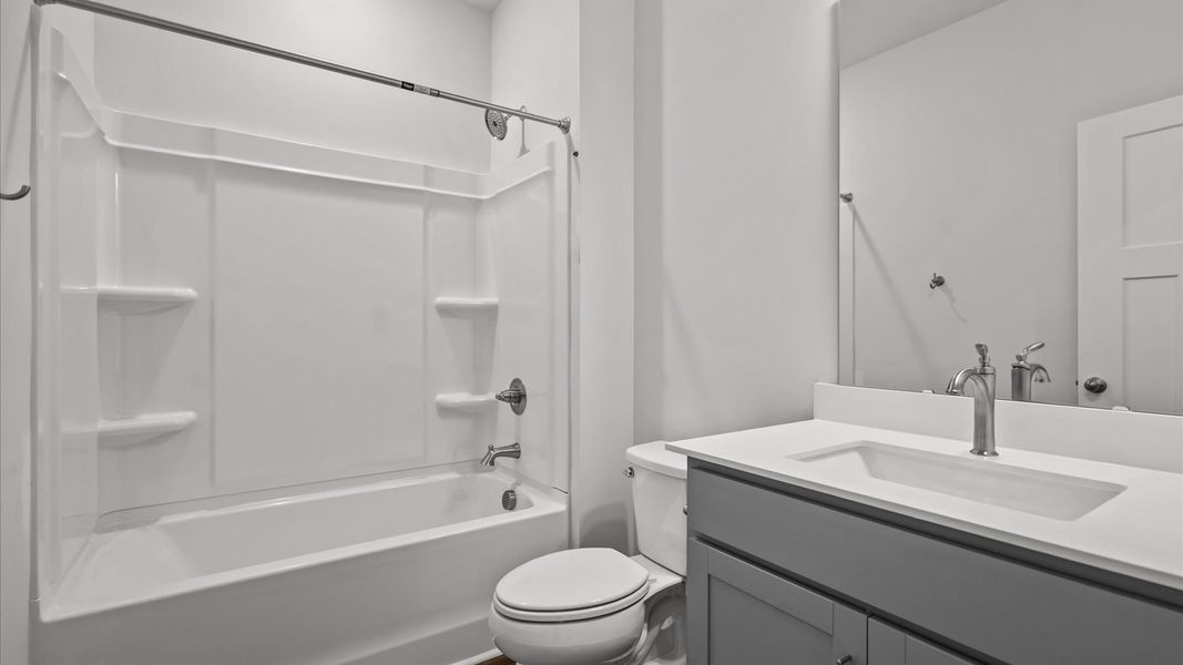 First-class guest bath featuring stylish fixtures and modern design elements