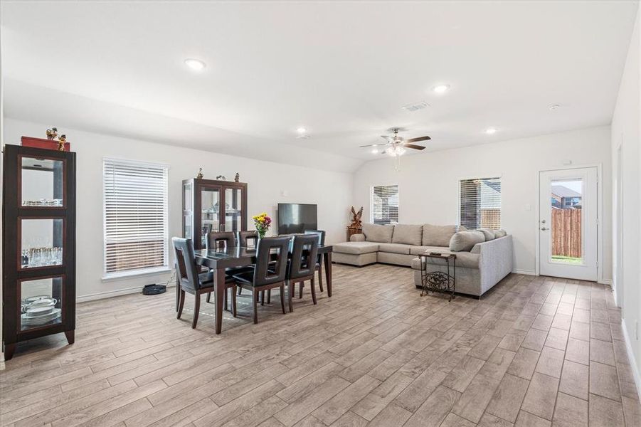 Combination dining and living area with an open floor plan, making it easy to entertain and mingle with guests.