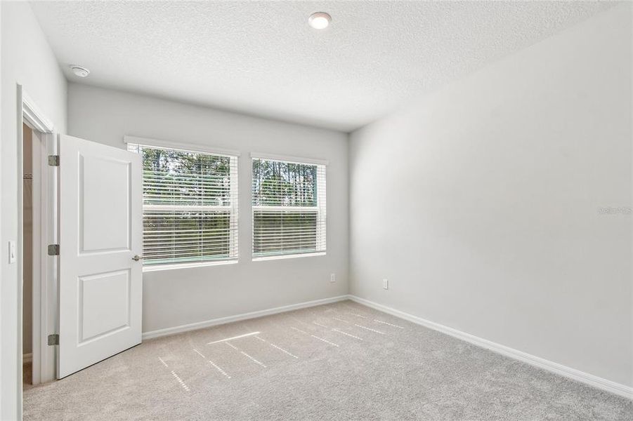 Spacious, unfurnished interior of a new home in Preserve at The Cays – The Driftwood Series, Daytona Beach (Image 30). Spacious, unfurnished interior of a new home in Preserve at The Cays – The Driftwood Series, Daytona Beach (Image 30).
