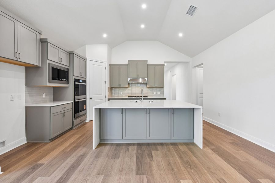 Furnished interior view inside a new home in Persimmon, Buda (Image 4).