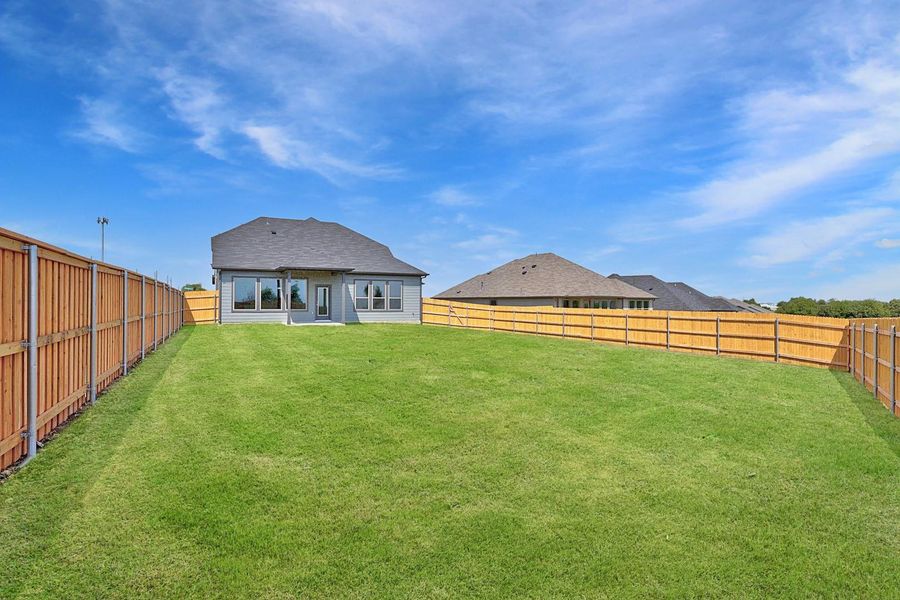 Exterior details and patio area of a home in Prairie Winds, Hutto (Image 4). Exterior details and patio area of a home in Prairie Winds, Hutto (Image 4).